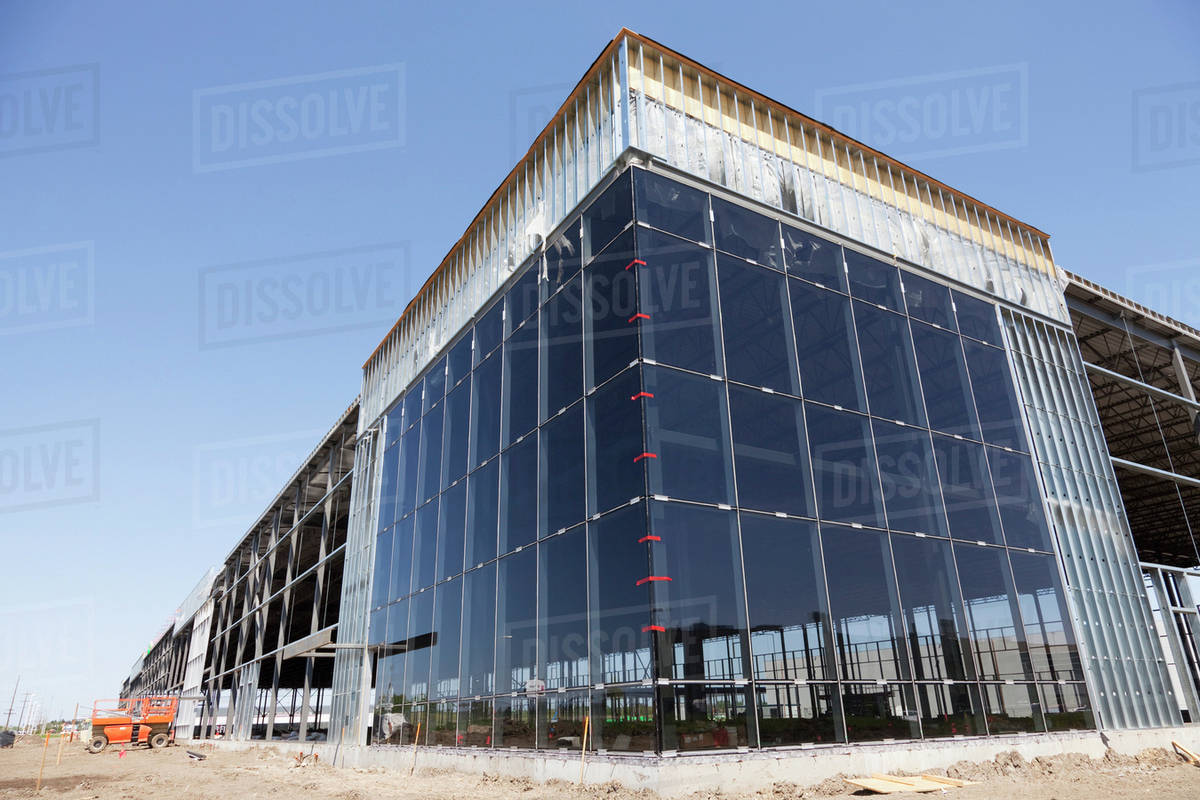Steel construction warehouse and glass installation; Edmonton, Alberta