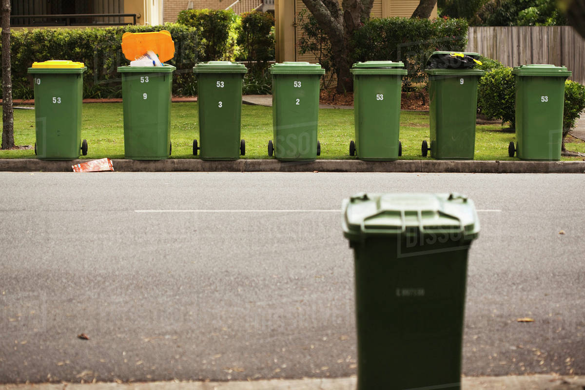 Rubbish Bins On A Curb In A Residential Area; Gold Coast, Queensland