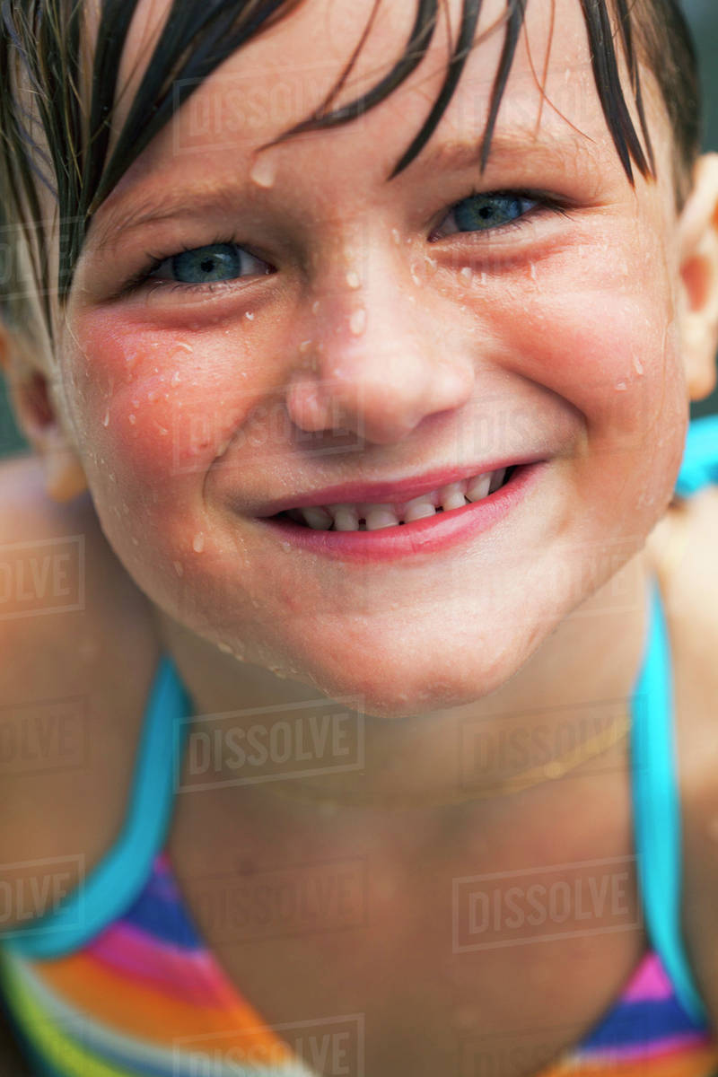 A girl with water droplets on her face;Gold coast queensland australia