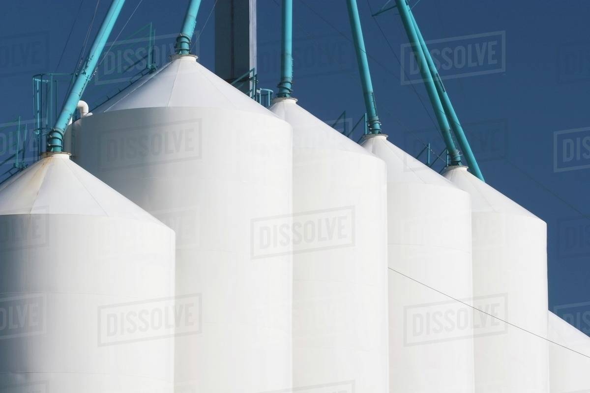 Large Metal Grain Bins, Alberta, Canada Stock Photo Dissolve