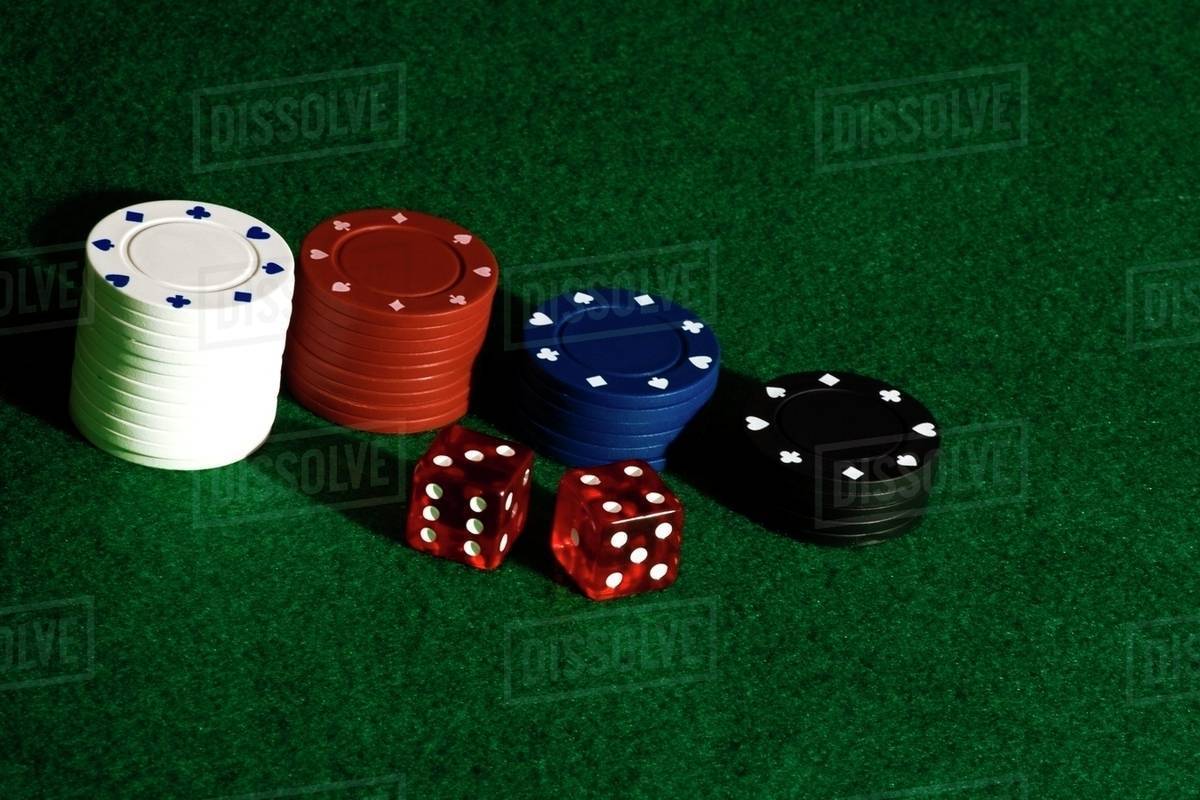 Poker Chips And Dice On Felt Stock Photo Dissolve