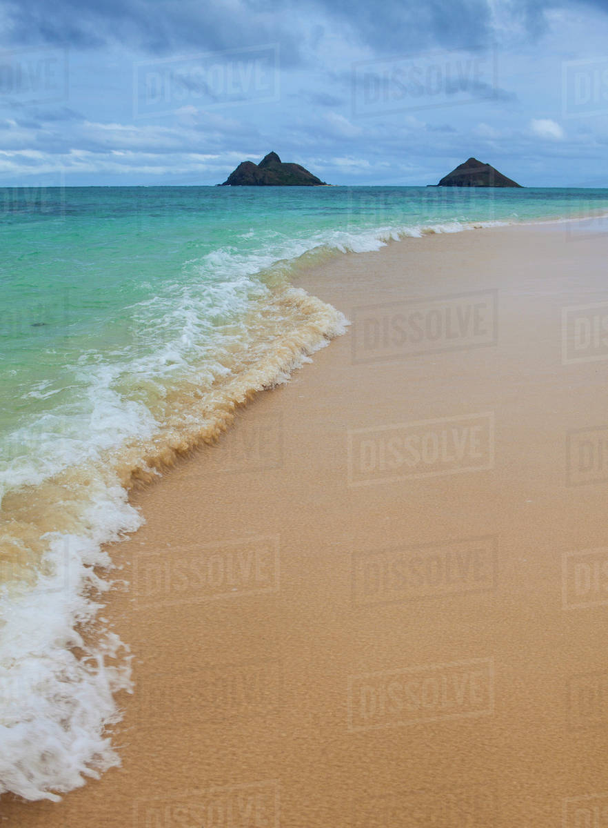 Waves on the shore at Lanikai beach; Kailua, Island of Hawaii Hawaii, United States of America