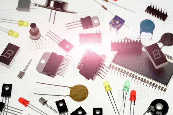 Variety of diode and transistors, white background - Stock Photo - Dissolve