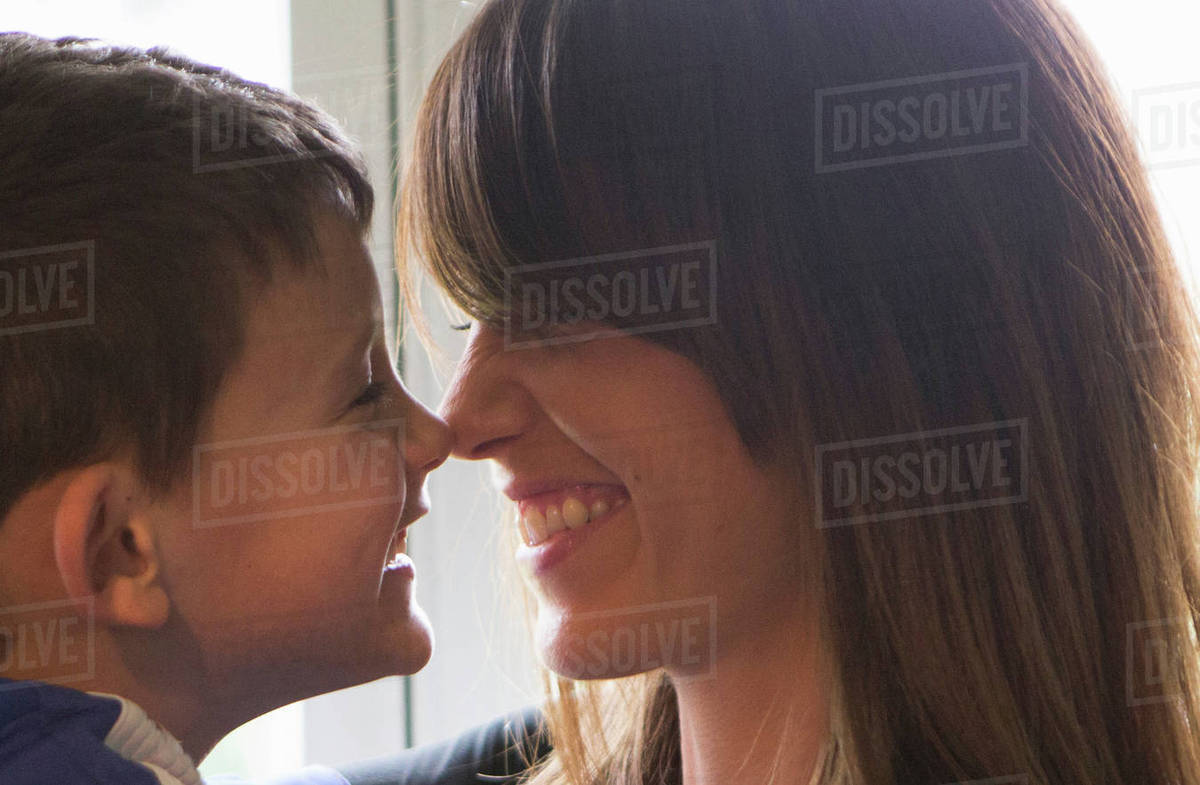 Mother and son rubbing noses together Stock Photo Dissolve
