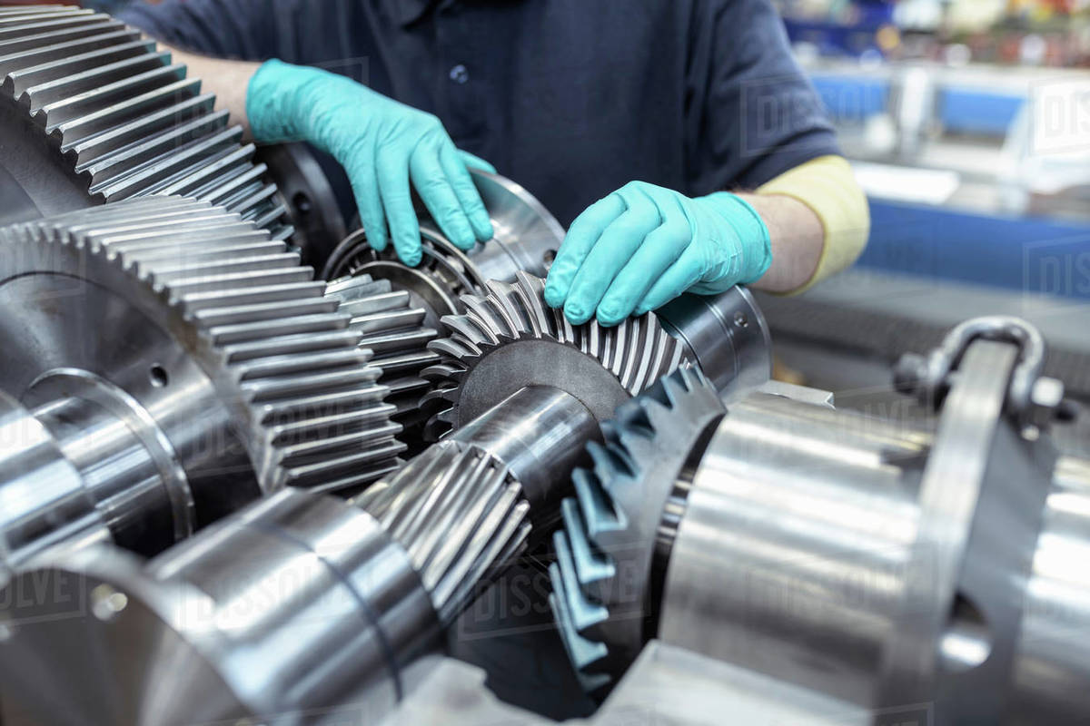 Engineer assembling gearbox in gearbox factory Stock Photo Dissolve