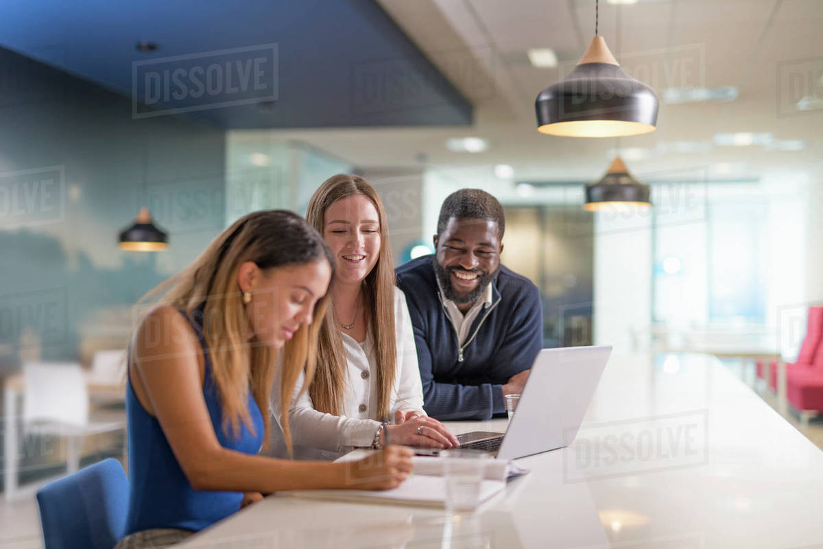 Automotive engineering apprentices relaxing in training facility Royalty-free stock photo