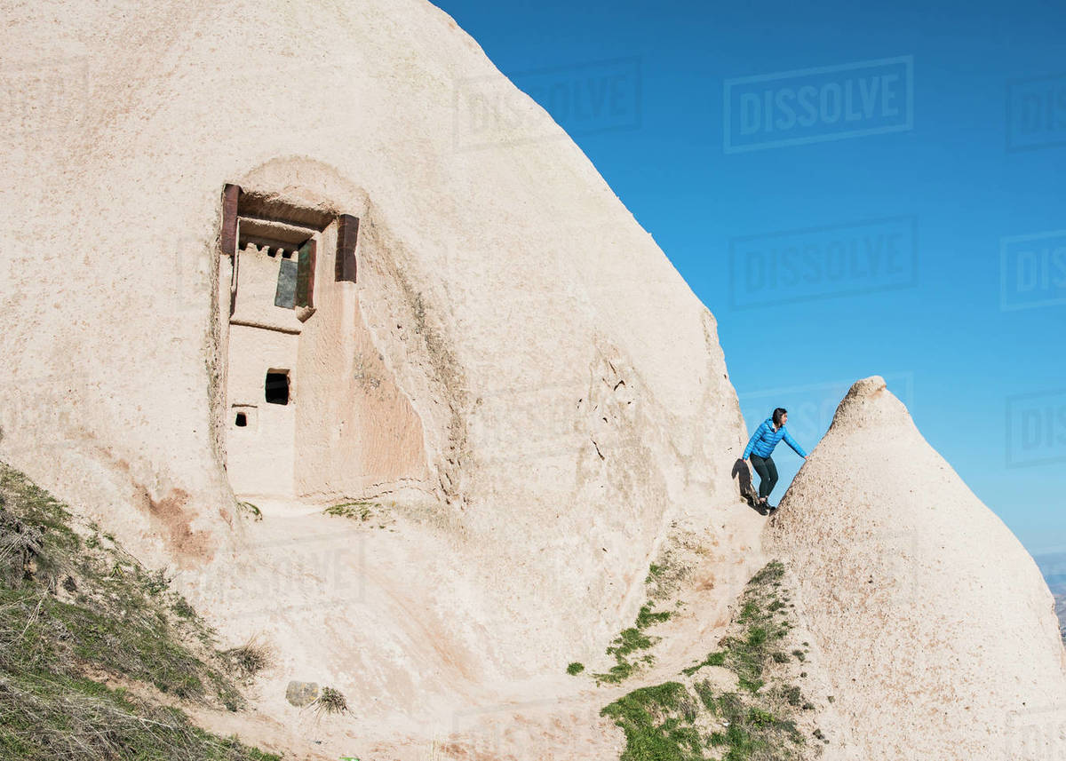 Woman exploring Uchisar Castle, Göreme, Cappadocia, Nevsehir, Turkey Royalty-free stock photo