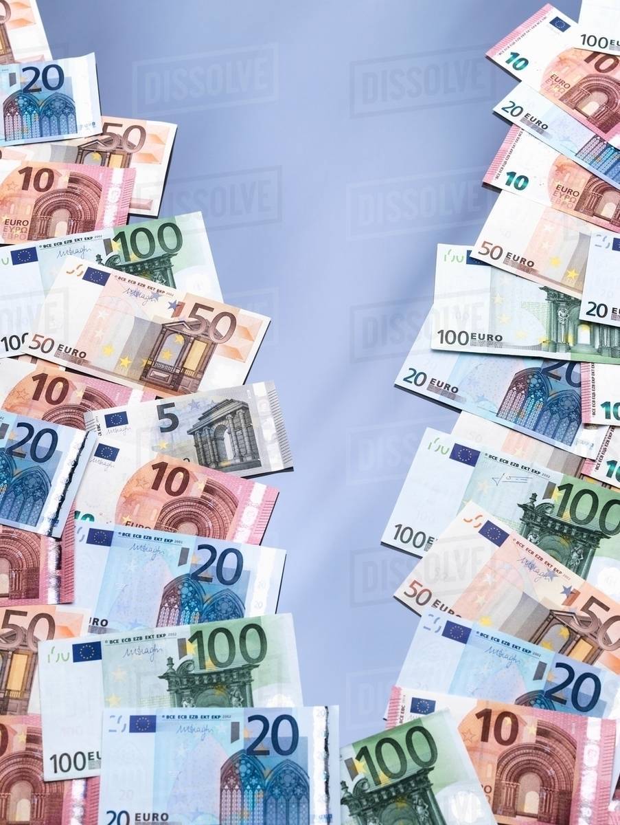 Euro Currency Notes Split Into Two Piles Stock Photo Dissolve Euro Currency Notes Split Into Two Piles