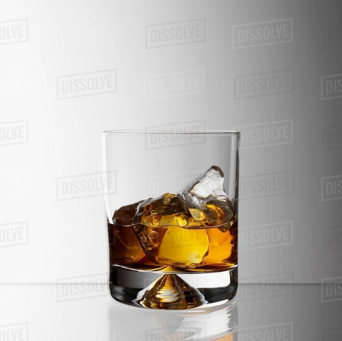 Whiskey on the rocks Stock Photo Dissolve
