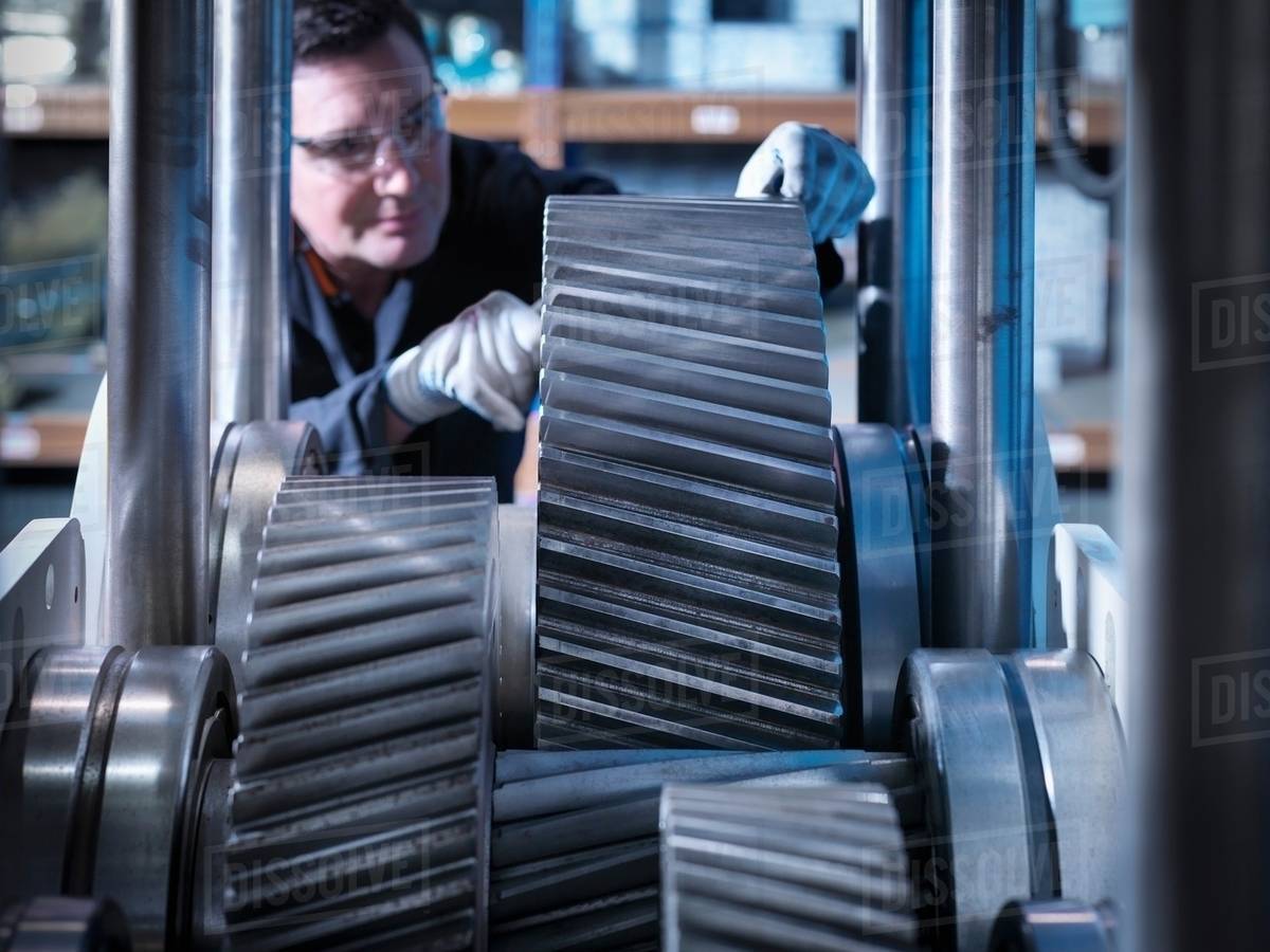 engineer working on industrial gearbox stock photo dissolve