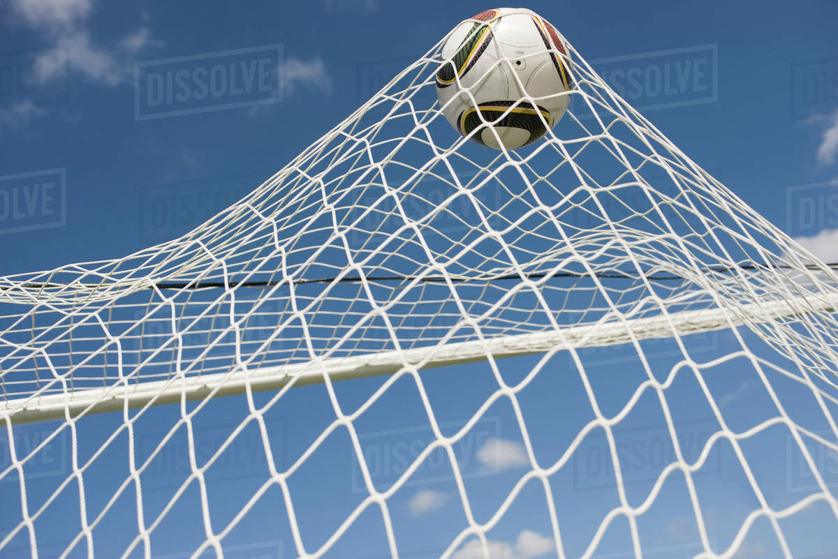 Soccer ball hitting net Stock Photo Dissolve