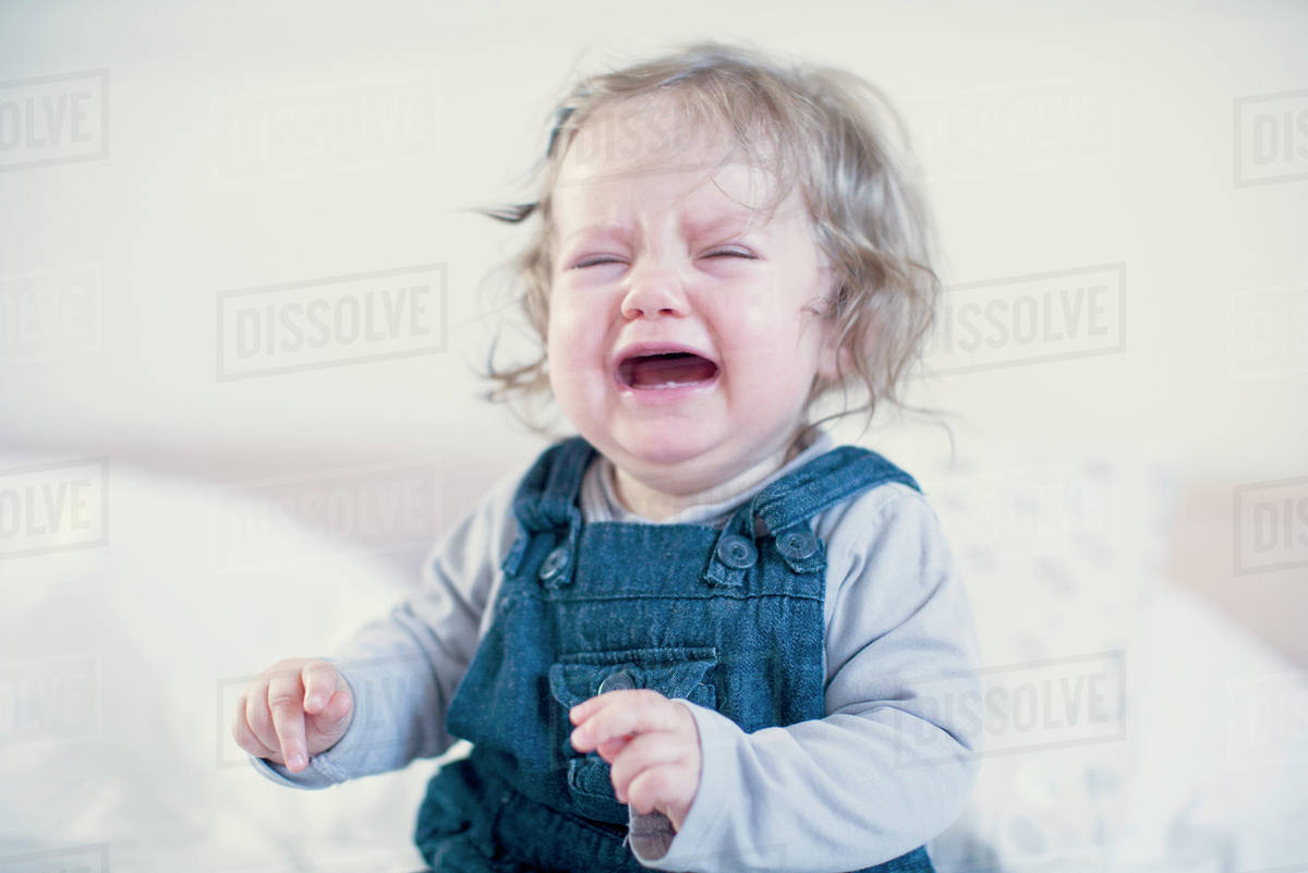 Baby girl crying Stock Photo Dissolve