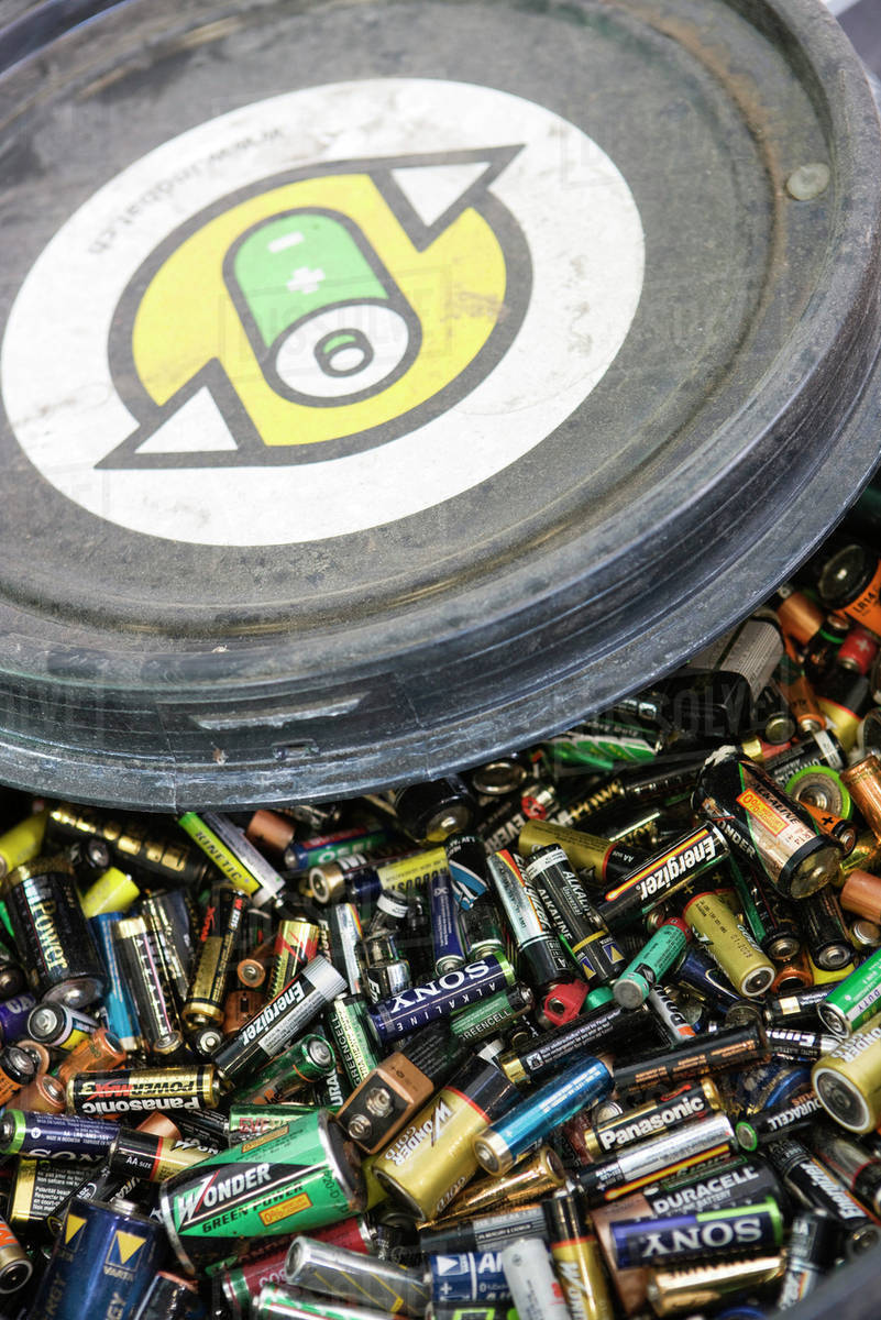 Batteries in recycling bin Stock Photo Dissolve