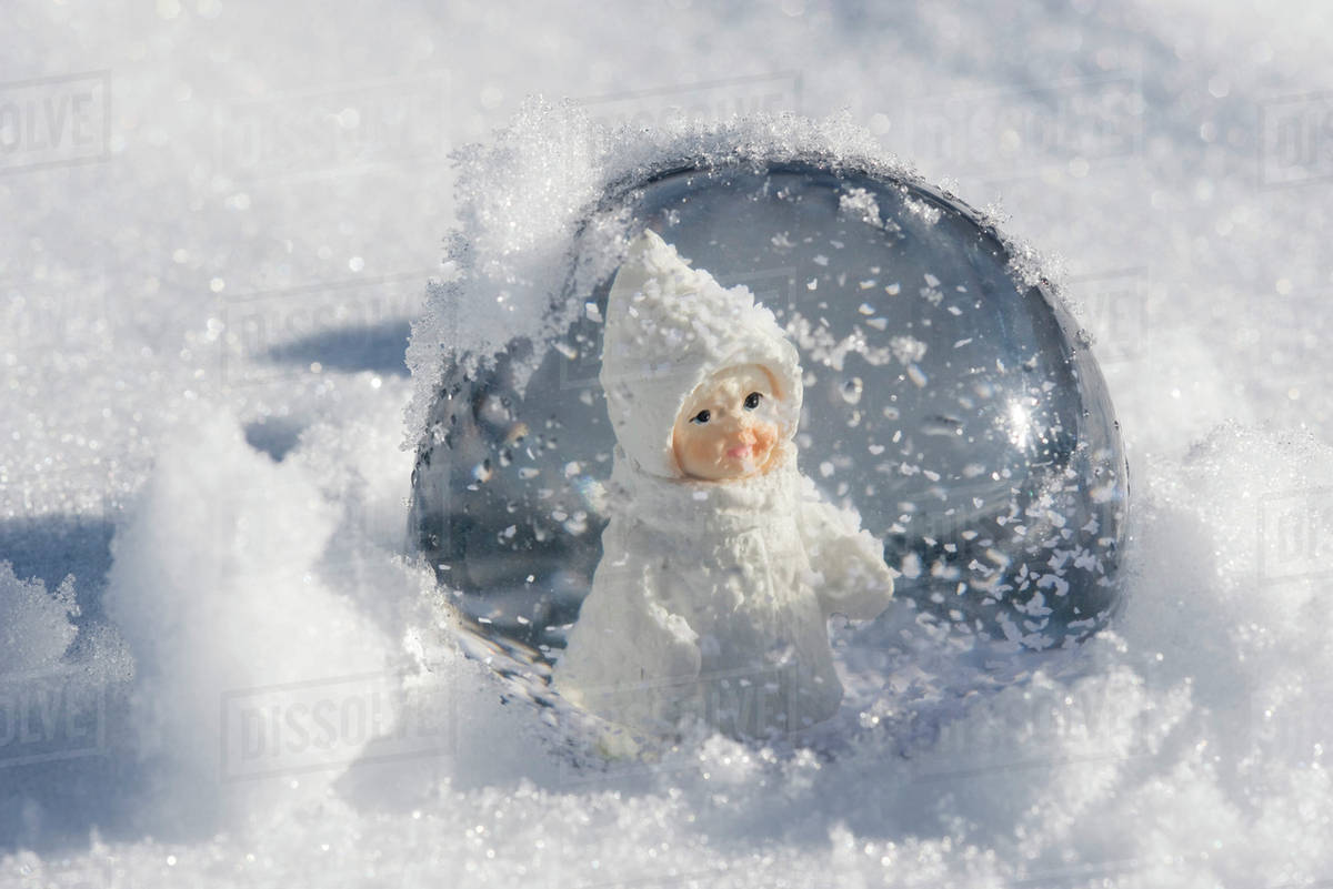 little girl snow globe