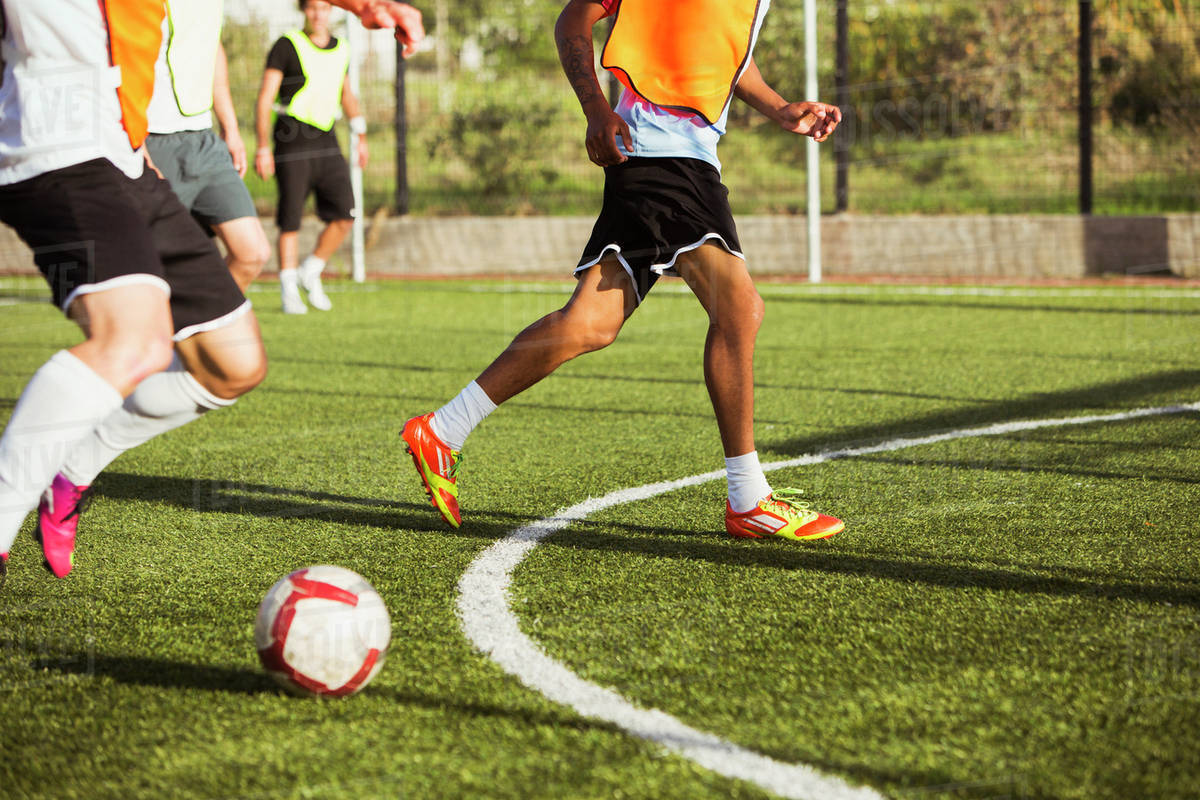 Soccer players training on field Stock Photo Dissolve