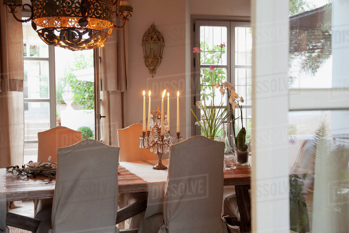 Candelabra On Table In Luxury Dining Room Stock Photo