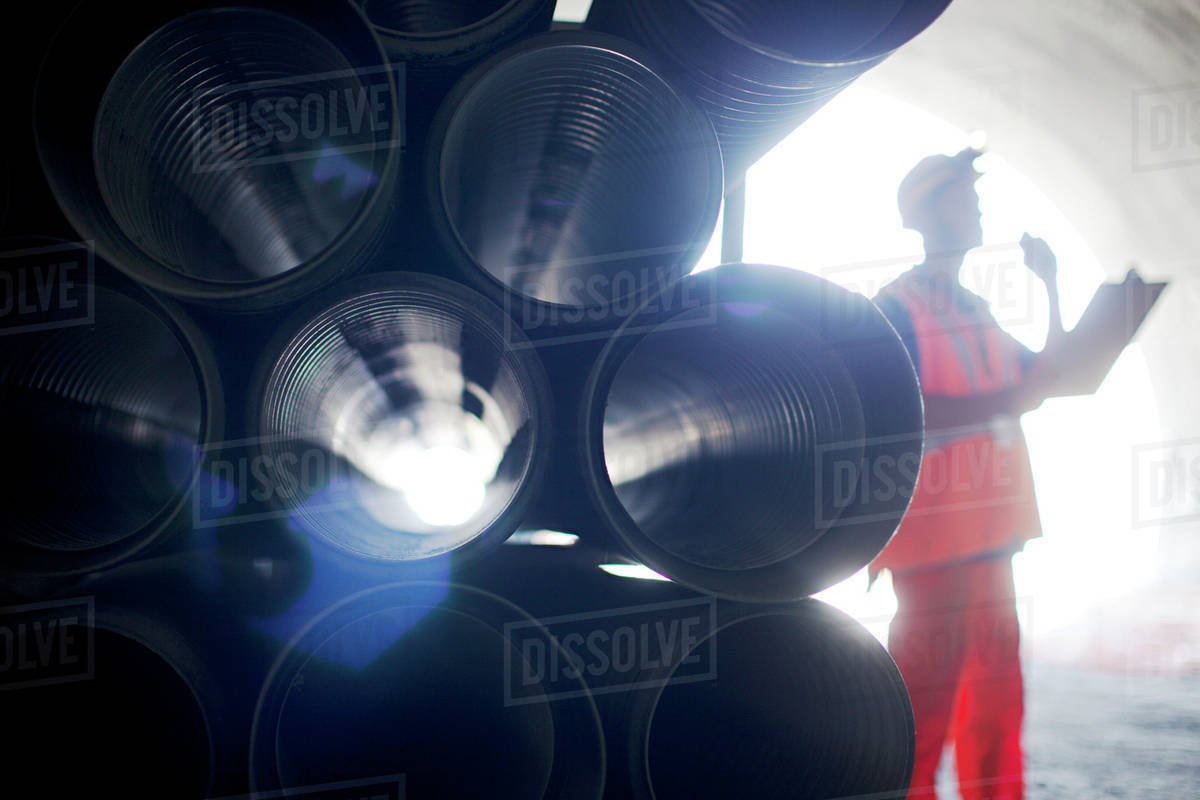 Close up of tubes in tunnel Stock Photo Dissolve