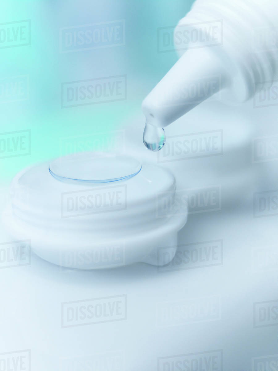 Closeup of saline dropping on contact lens Stock Photo Dissolve