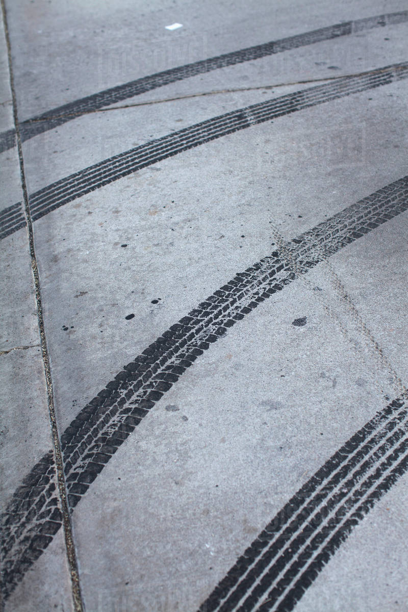 Tire marks on concrete Stock Photo Dissolve