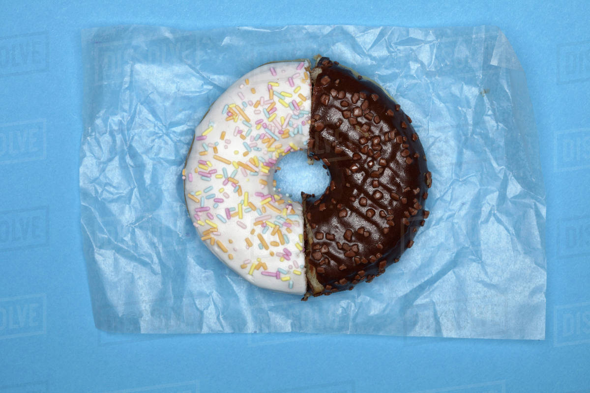 A donut made from two halves Stock Photo Dissolve