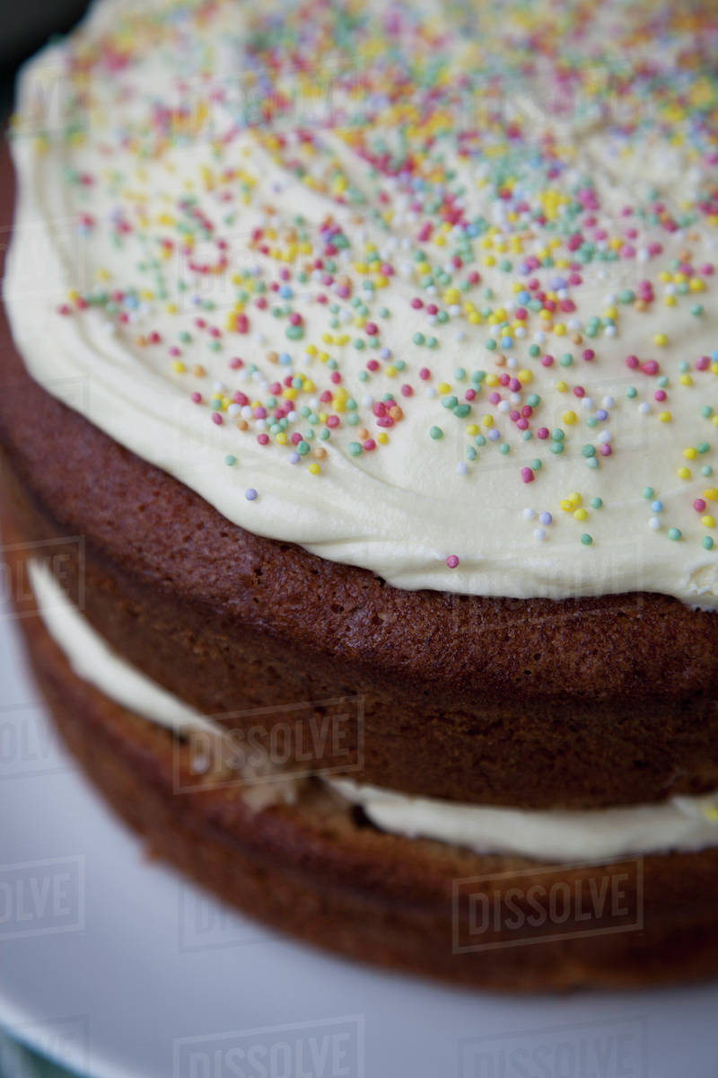 Cake with sprinkles, close-up - Royalty-free Stock Photo | Dissolve