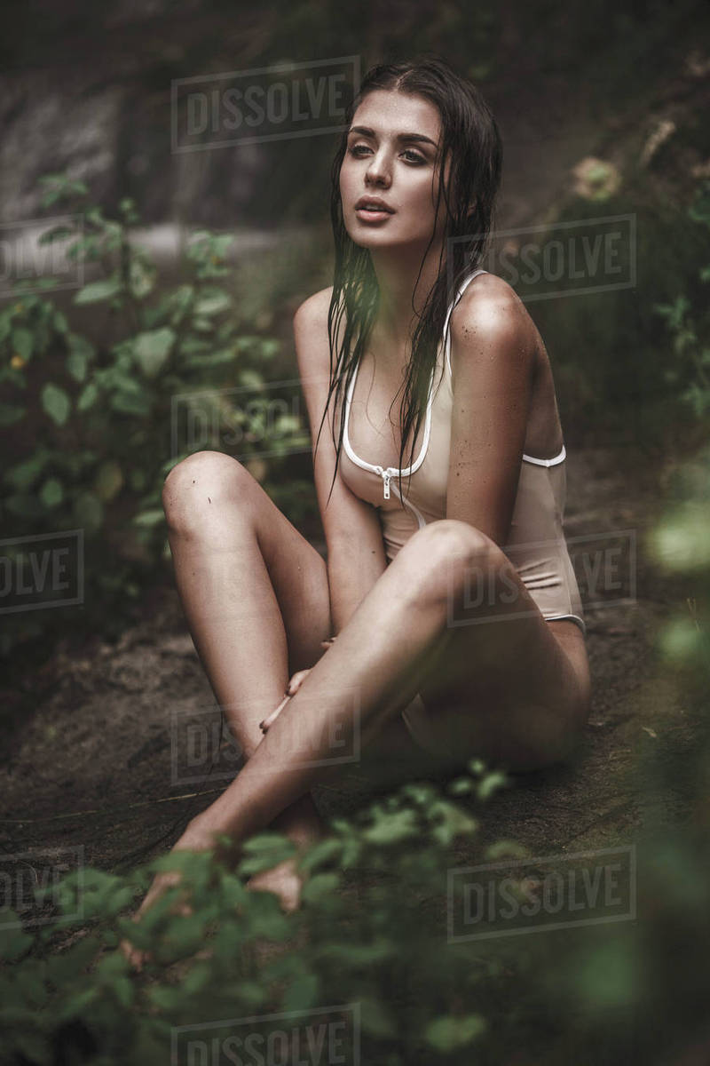 Thoughtful Sensuous Young Woman In Swimwear Sitting At Forest Royalty Free Stock Photo Thoughtful Sensuous Young Woman In Swimwear Sitting At Forest Royalty Free Stock Photo