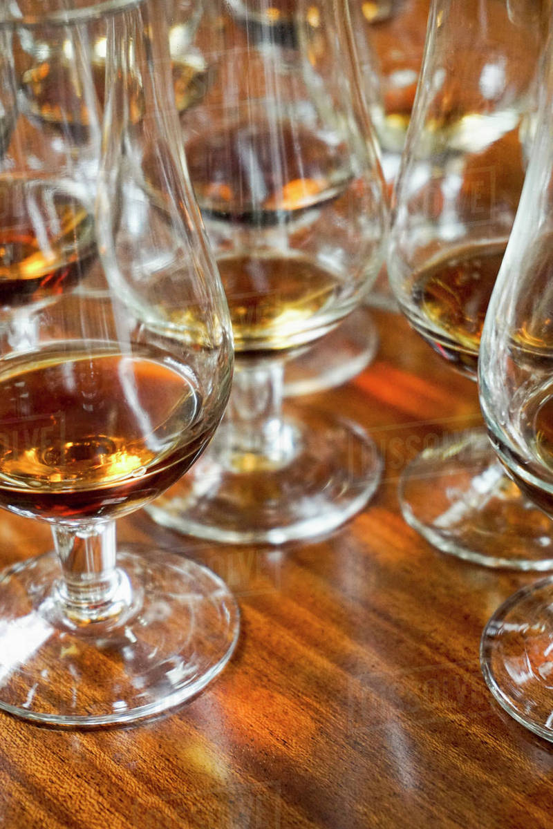 Closeup of Madeira wine in glasses on table at bar Stock Photo